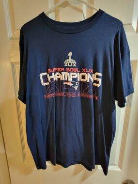 Majestic t-shirt. Has New England Patriots Super Bowl XLIX Champions-size Large